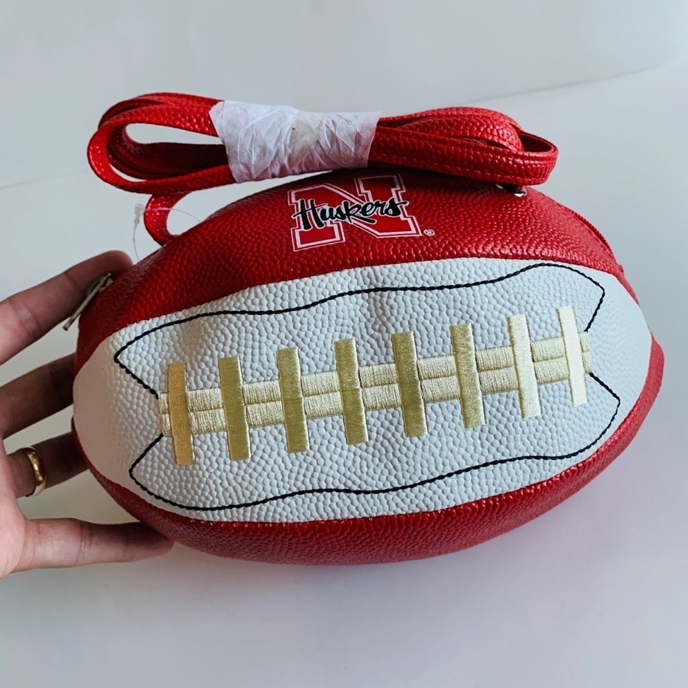 Red Football-Inspired Crossbody Bag with Gold Accents